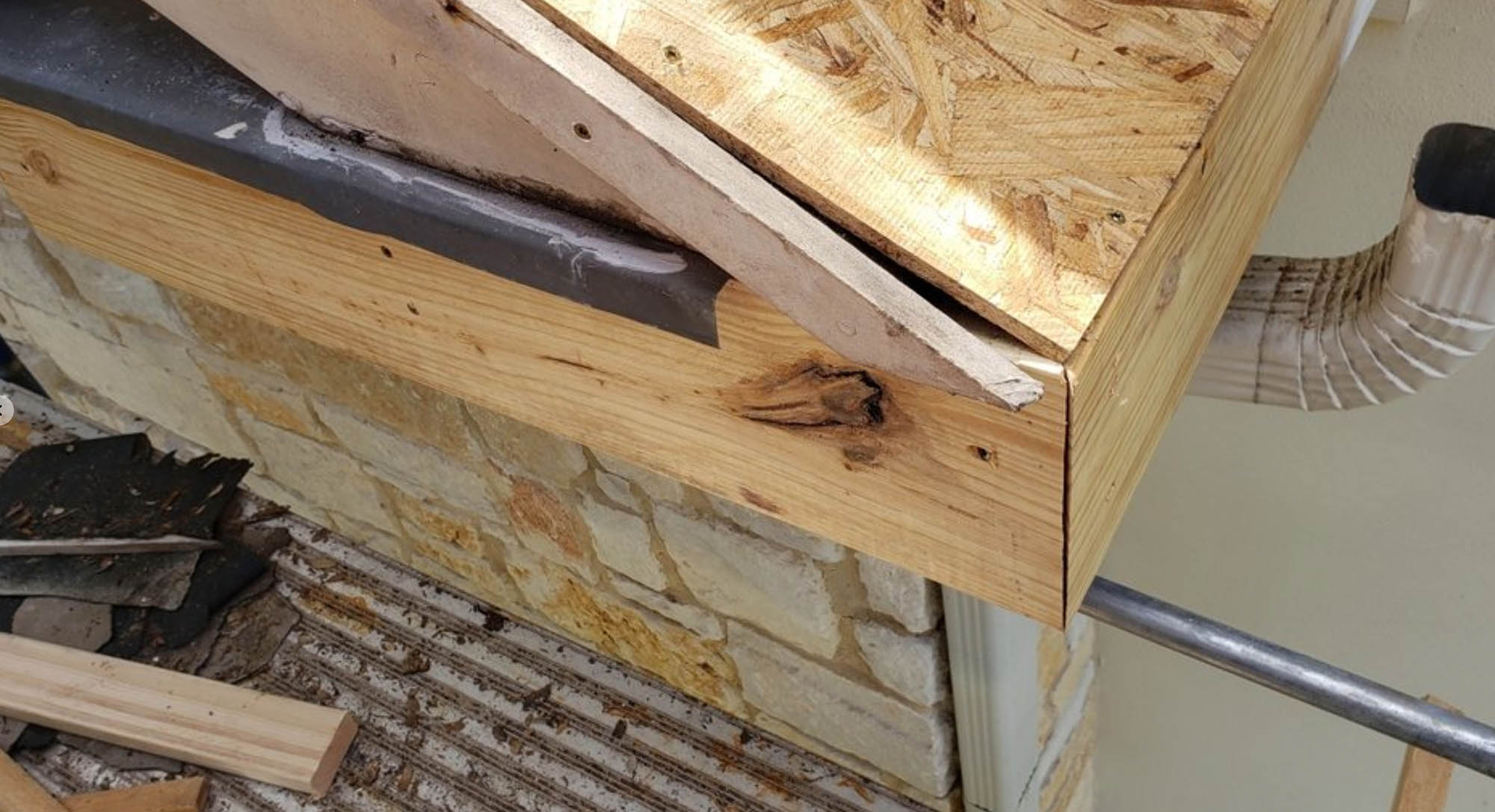 roof repairs texas Exposed roof eave with new wooden fascia
